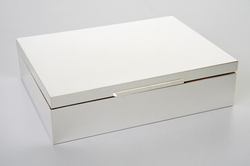 Three quarter view of rectangular wood white box isolated on white