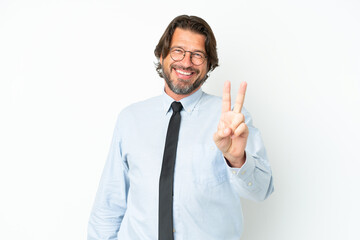 Senior dutch business man isolated on white background smiling and showing victory sign