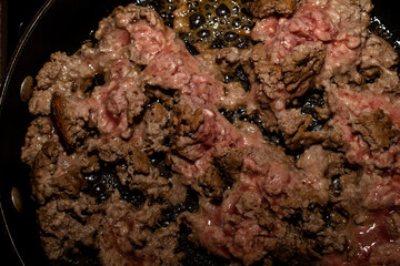 Ground Beef frying in a pan 