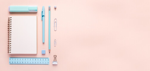 Top view flat lay of woman blue workspace desk styled design office supplies with copy space on a millennial pink color paper background minimal style. Square Template for feminine blog social media