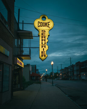 Cooke Serrurier locksmith vintage sign at night, Shawinigan, Québec, Canada