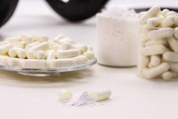 creatine pills, food supplement or energy vitamin for physical activity. Medicine to lose weight used in bodybuilding