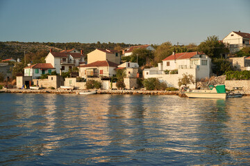 Fototapeta premium European Croatian village on the island. Houses are close to the water