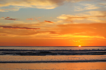 Rolling Waves at Sunset