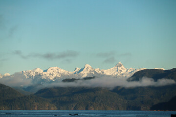 Snow Capped Mountains Across the Strait