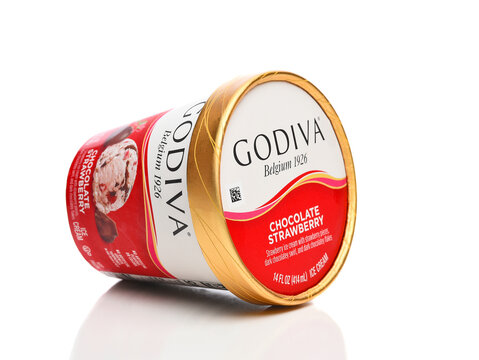 IRVINE, CALIFORNIA - 8 AUG 2022: A 14 ounce carton of Godiva Chocolate Strawberry Ice Cream, side view.