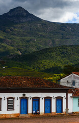 The main square of small Catas Altas colonial mining town surrounded by the mountains of the Serra...