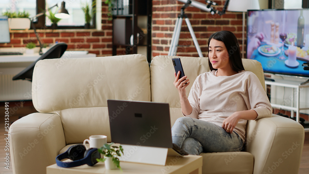 Poster joyful woman working remotely while in online videoconference on smartphone with coworker. smiling p