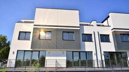 Terraced family home in newly developed housing estate. The real estate market in the suburbs.