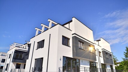 Terraced family home in newly developed housing estate. The real estate market in the suburbs.