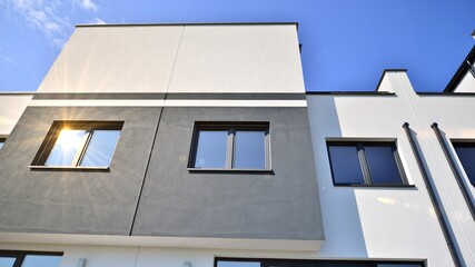 Terraced family home in newly developed housing estate. The real estate market in the suburbs.