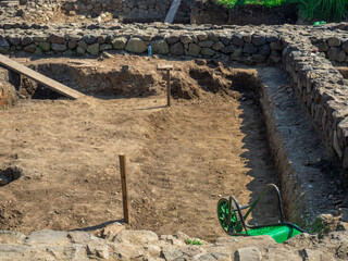 Loopholes. Battle tower. Castle defense.  Archeology.  Ruins of an ancient castle. At the...