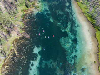 Kayaking a crystal clear river in Oregon