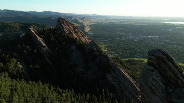 Flatirons rock formations in Boulder, Colorado. Close-up drone footage flying through the iconic rock formations.