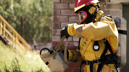 Fototapeta premium Workflow. Gas mask. Clip. Men in gas masks in the working environment .