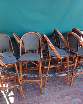 Chairs Collected And Secured For The Night After The Dinner Shift Of A Restaurant