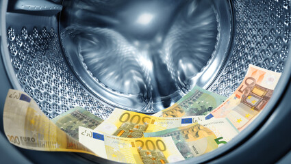 Money laundering. Many euro banknotes in washing machine
