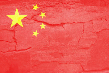 Defocus China flag, official colors and proportion correctly. National China flag. Stone wall...