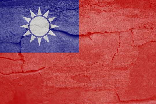 Defocus Taiwan flag, official colors and proportion correctly. National Taiwan flag. Stone wall background. Crack. Democracy. Out of focus