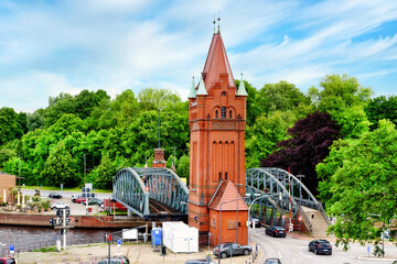 Obraz premium Old lift bridge with bridge tower in brick architecture in Luebeck, Germany