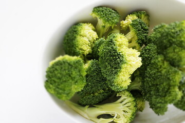 prepared broccoli in white background with copy space