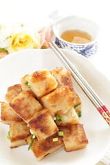 Chinese food, radish cake and XO sauce stir fried with spring onion 