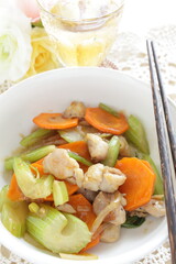 Chinese food, chicken and carrot stir fried with celery