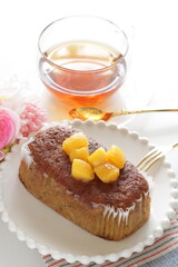 Homemade mango and tea leaves cake on white dish