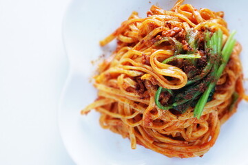 Chinese food, spicy minced pork and noodles with spinach 