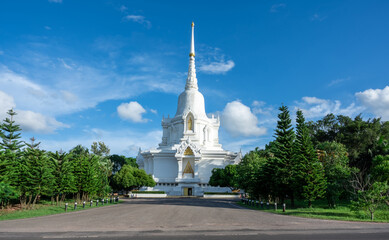 Fototapeta na wymiar White pagodas with blue sky background. Thailand Temple.