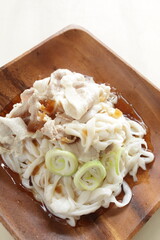Japanese dried Udon noodles, boiled and prepared on bamboo basket