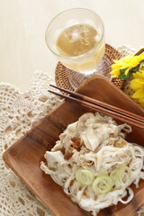 Japanese dried Udon noodles, boiled and prepared on bamboo basket