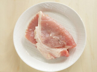 Prepared seasoning pepper and salt on sliced pork