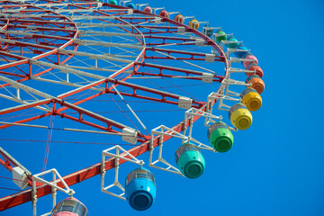 Ferris Wheel Over Blue Sky