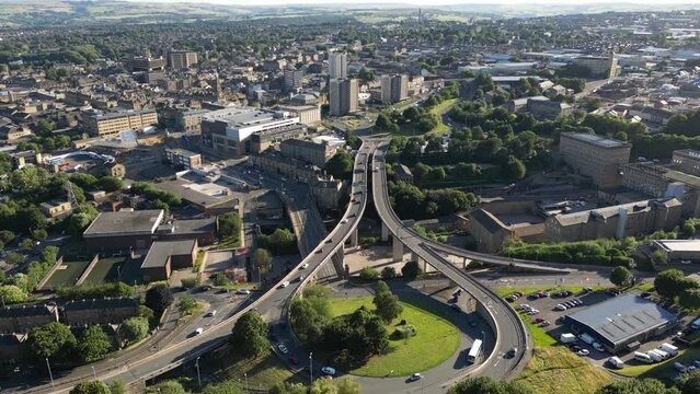 Aerial view of Burdock Way and North Bridge with the Town of Halifax, West Yorkshire, UK in the distance