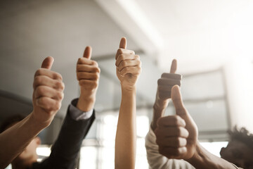 Thumbs up hand sign, symbol and gesture showing success, support or trust. Closeup fingers or thumbs of businesspeople endorsing idea, plan or strategy and expressing content or approval to good news