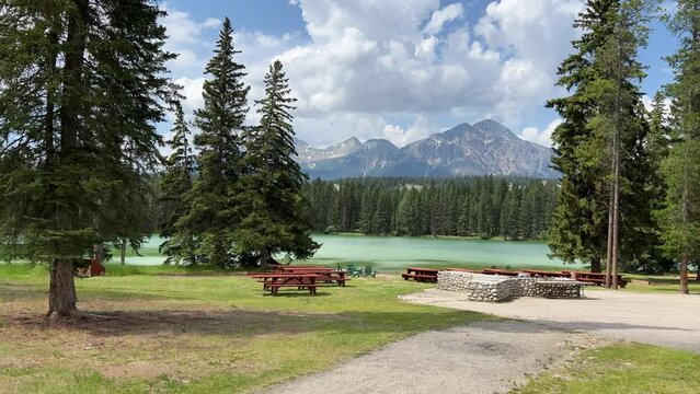 Trefoil lake in Jasper National Park, Canada. A calm and quiet scene featuring the tranquil waters of trefoil lake.