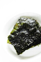 Korean food, sesame oil seaweed sheet on white dish