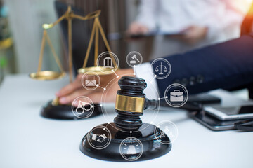judge on wooden table And experienced lawyers meet with clients and give advice behind the scenes. legal services legal consulting concept