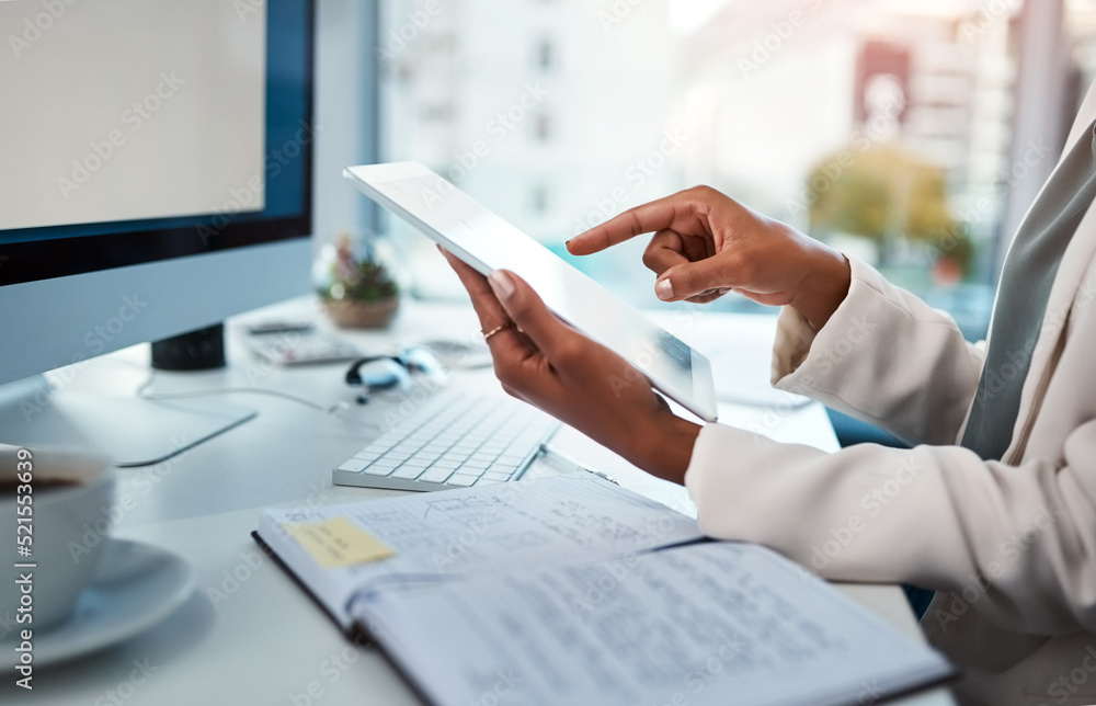 Poster businessperson hands working on a digital tablet at a desk in a modern office. closeup of business p