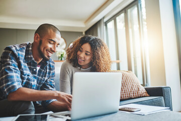 Finance, budget and ebanking couple working on laptop looking happy and hopeful about savings,...