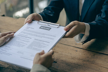 Successful good interview
HR checks job applicants' resumes. Concept of hiring, business and human resource management.