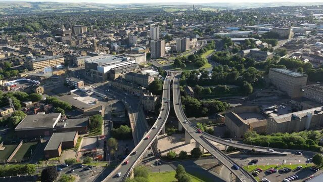 Aerial view of Burdock Way and North Bridge with the Town of Halifax, West Yorkshire, UK in the distance