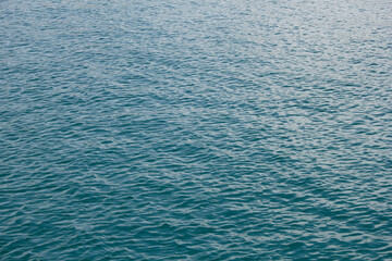 Fototapeta premium A view of calm ocean water texture, as a background.