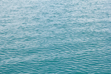 A view of calm ocean water texture, as a background.