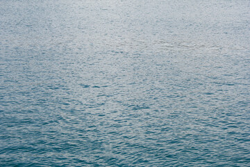 A view of calm ocean water texture, as a background.
