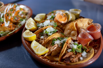 A view of a plate of street tacos.