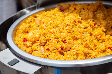 A view of a stockpot full of jambalaya.