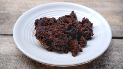 Rendang Padang. Beef Rendang The most famous traditional meat dish originating from the Minangkabau tribe of West Sumatra, Indonesia