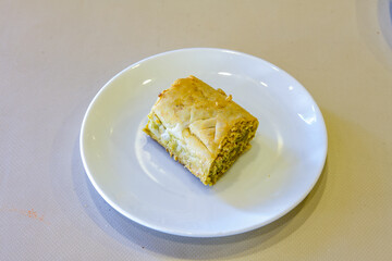 Turkish Dessert Sobiyet  Baklava, mussels baklava and classic baklava with Pistachio . Cevizli, Fistikli Baklava, top view.
